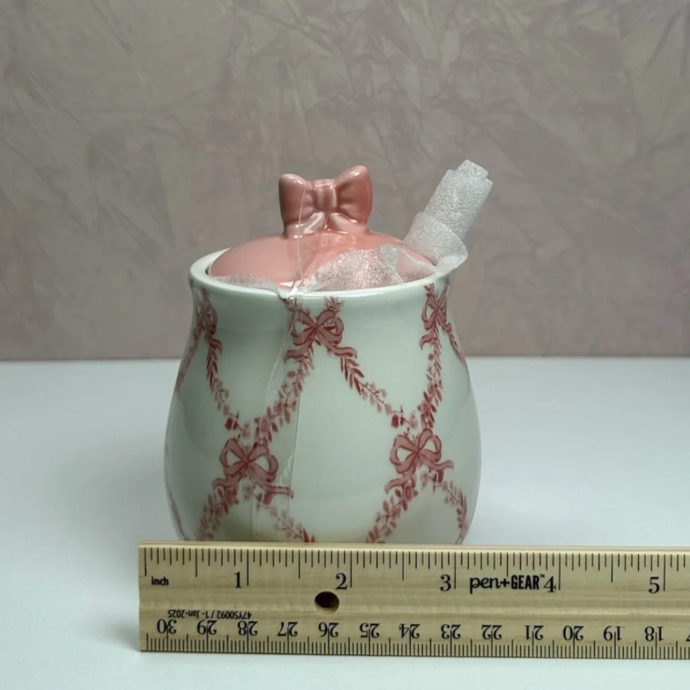 Elegant Pink and White Ceramic Sugar Bowl with Bow Accents